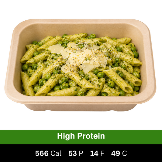 High-protein creamy chicken pesto pasta with penne, green peas and parmesan. Fresh chef-made ready meal from Fuel & Prep Co.