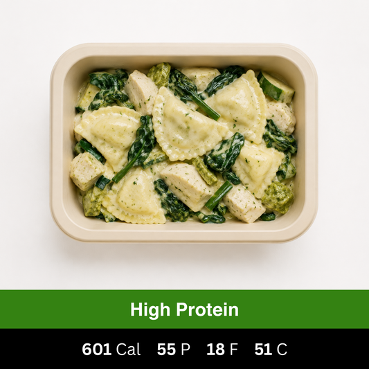 High-protein spinach and ricotta agnolotti served with creamy pesto chicken and leafy greens. Fresh ready-made meal by Fuel & Prep Co.